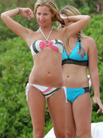 Ashley Tisdale relaxing in hot bikini on