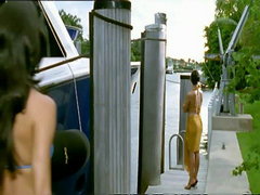 Eva Longoria wearing a blue bikini and..