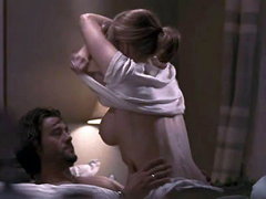 Lauren Holly naking out with a guy in..