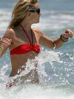 Kate Hudson caught in wet red bikini on