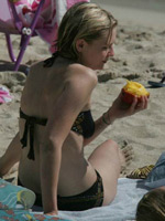 Kirsten Dunst sunbathing in sexy black