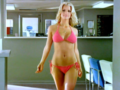 Jessica Simpson fills a bikini quite..