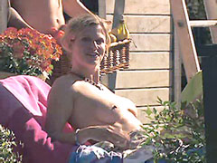 Naked Noelle Evans sunbathes