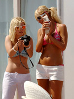 Celebrity Paris Hilton in bikini on beach