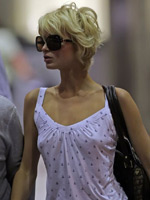 Celebrity babe Paris Hilton relaxing on..