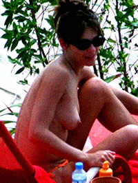 Elizabeth Hurley caught topless on the..