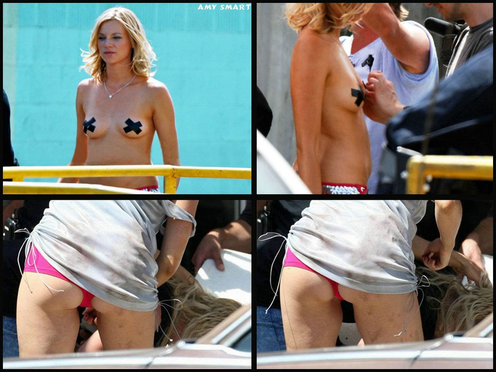 Charming celeb Amy Smart going in the outdoors flashes her tits. 