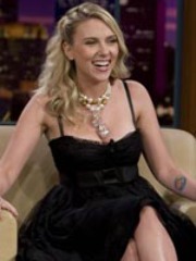 Scarlett Johansson flaunts a bit of her..