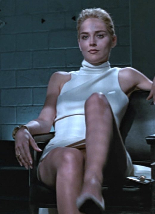 Sharon Stone in an upskirt scene of her movie showing her pussy. 