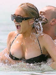 Lindsay Lohan boob slip in a bikini