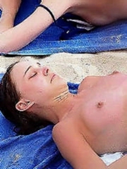Natalie Portman topless sunbathing at the