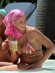 Tara Reid big boobs in a little bikini