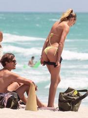 Candice Swanepoel sexy in a thong bikini